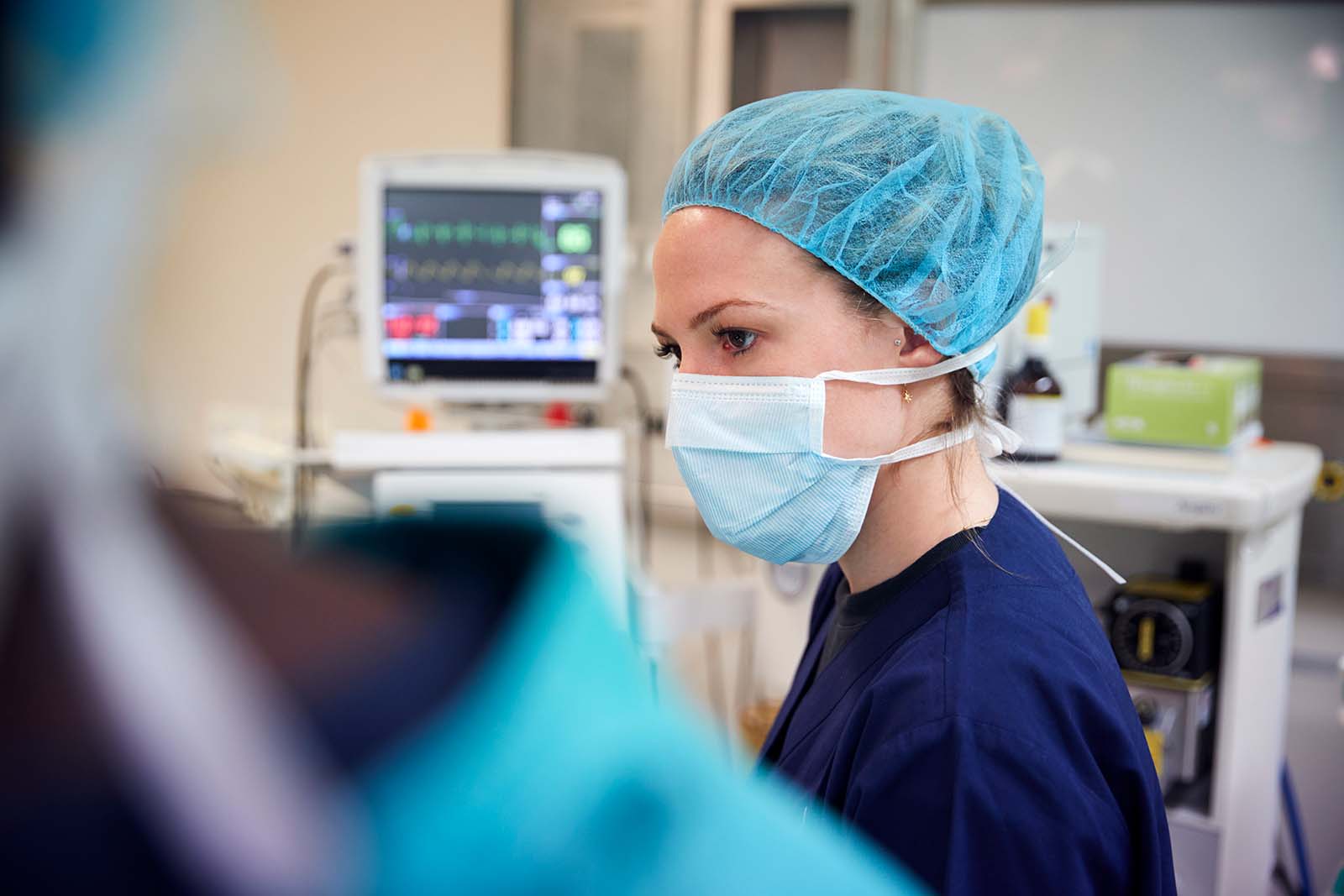 A surgical team at work in an NHS operating theatre