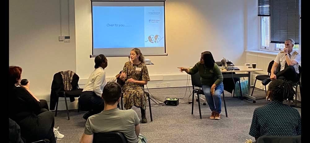 Cabin crew leading a WingFactors patient engagement session with NHS staff